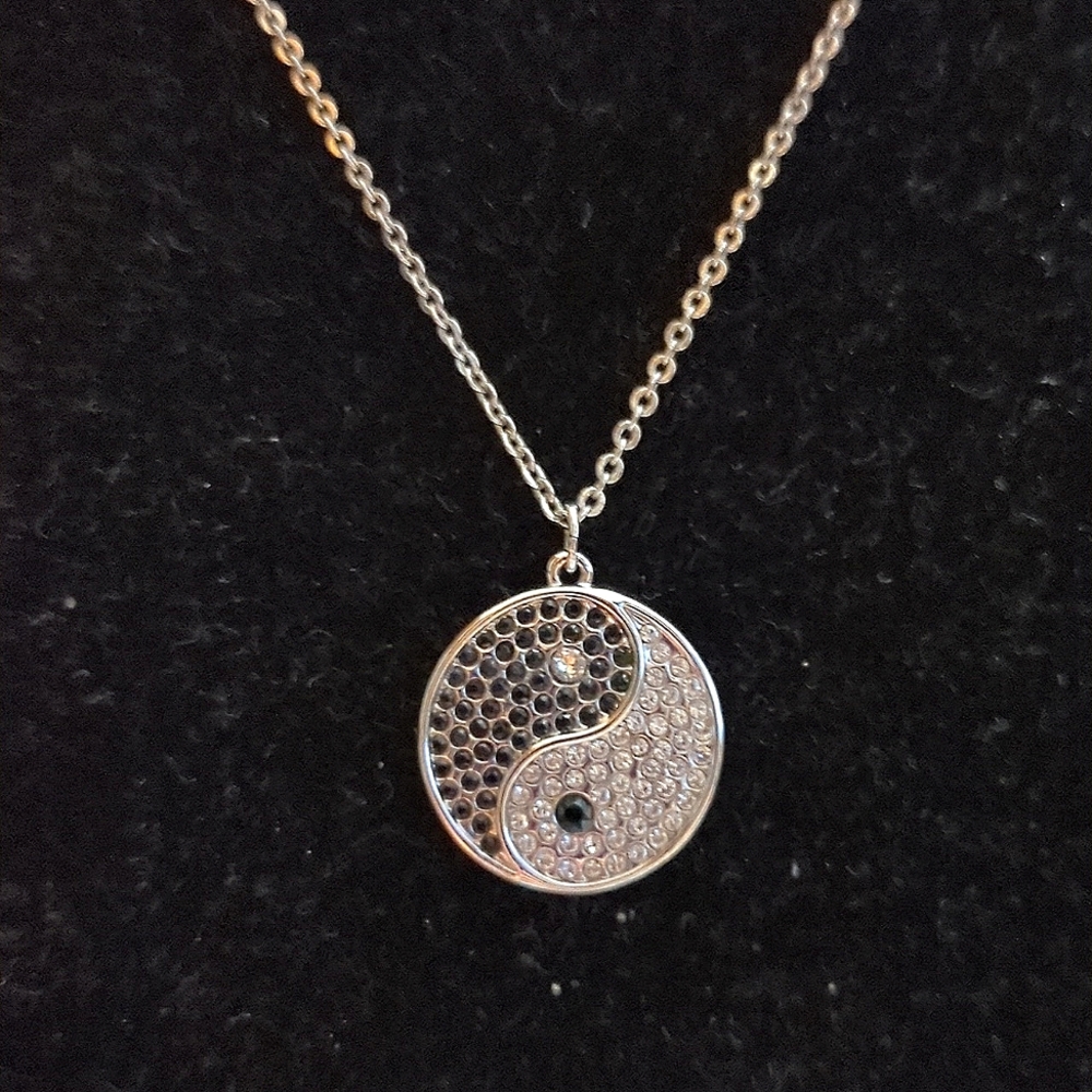 Yin and yang touchstone crystal necklace